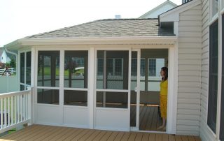 deck with a screened in room