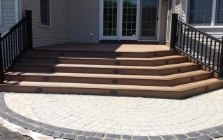 wood steps down to patio